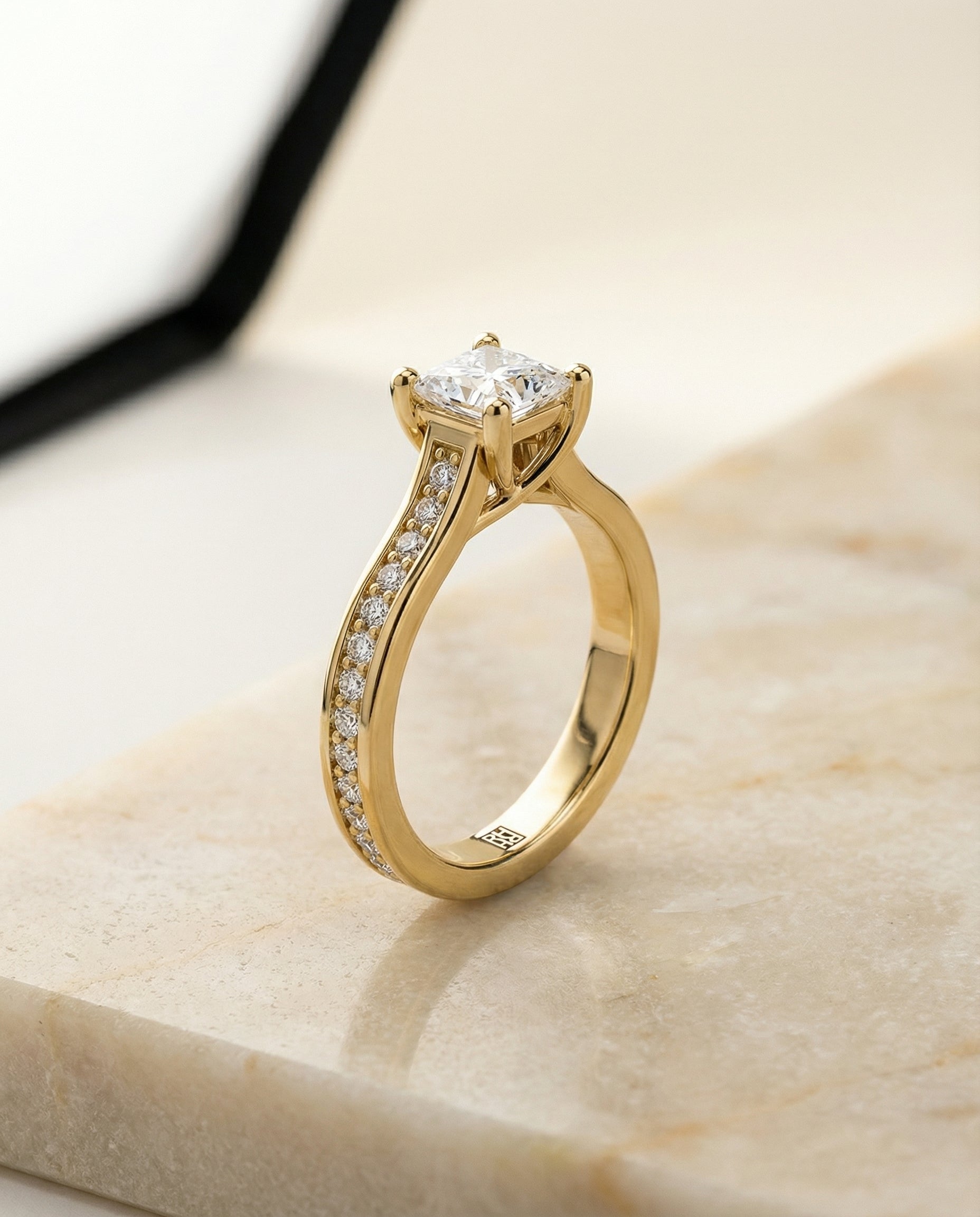 The Celesta channel set pavé engagement ring setting, shown in 18K Yellow Gold | RockHer