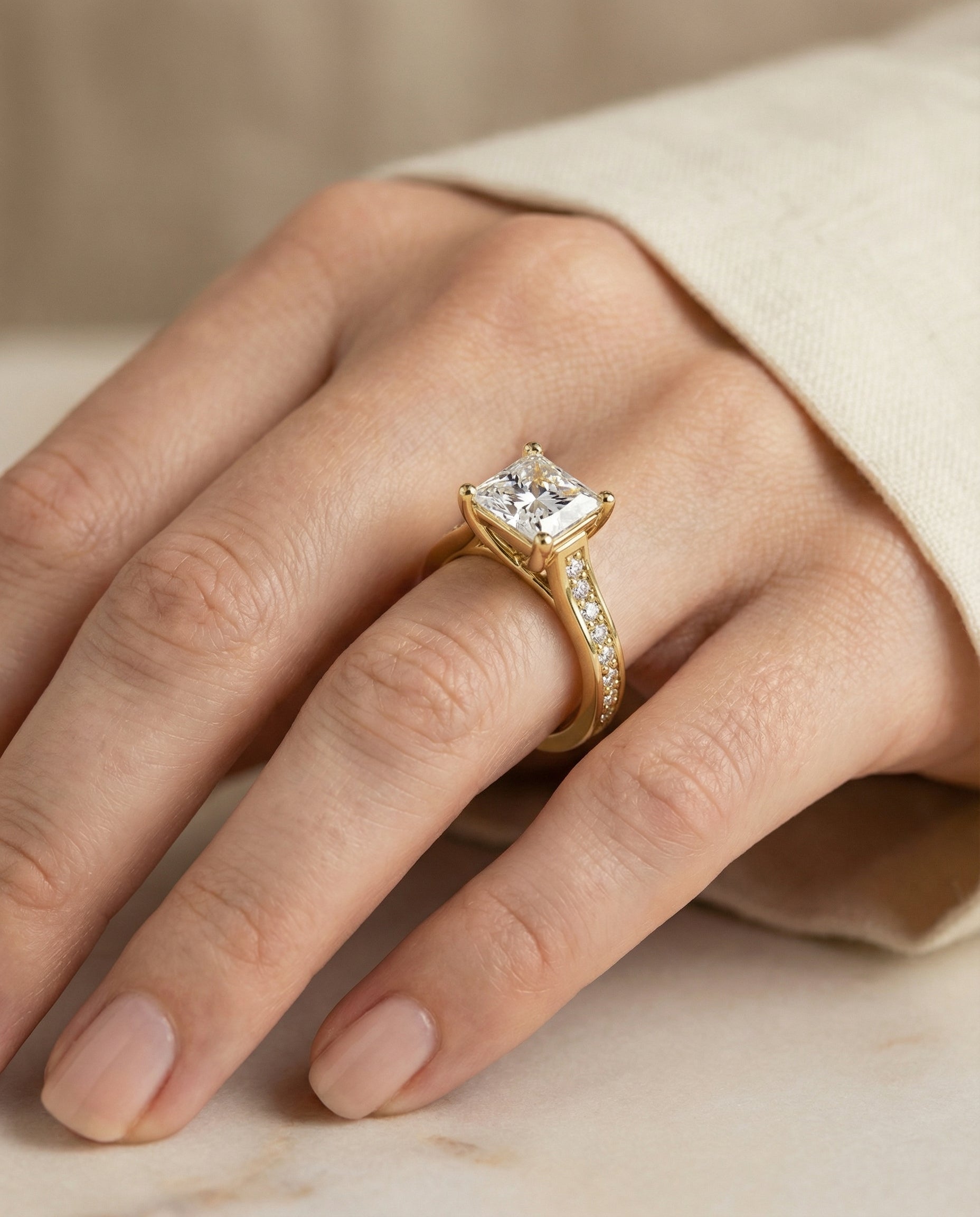 The Celesta engagement ring setting in 18K Yellow Gold, channel set pavé design | RockHer