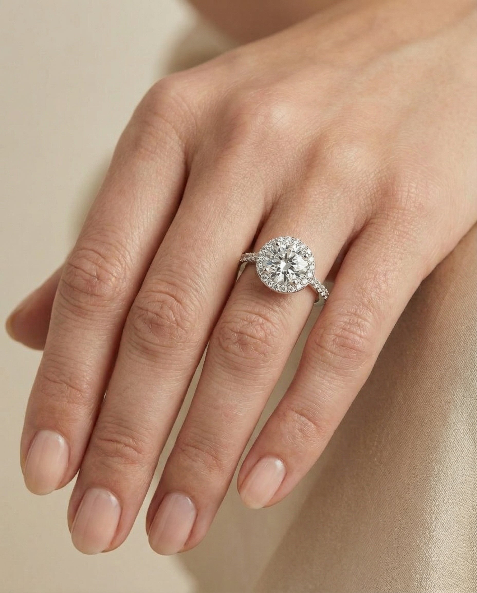 The Taylor pavé halo engagement ring setting, shown in Platinum | RockHer