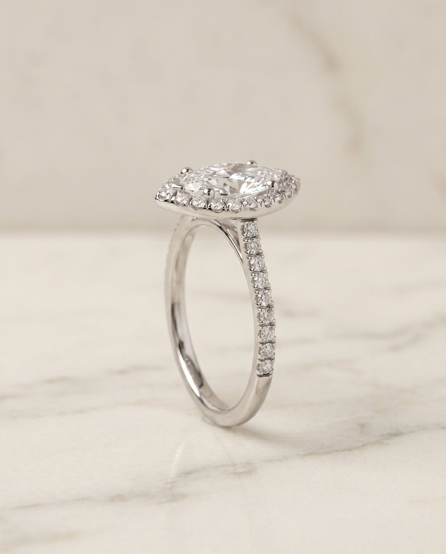 Classic French Pavé Halo Linear Marquise, in Platinum, pave setting – front view | RockHer