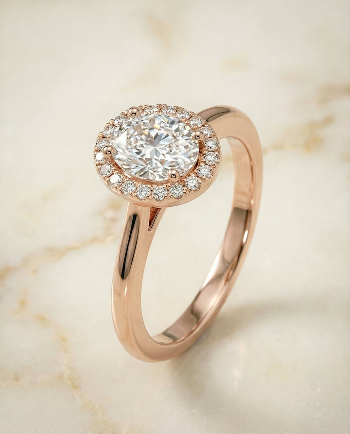 Kate Select classic french pavé halo oval oval ring in 14K Rose Gold — front — RockHer
