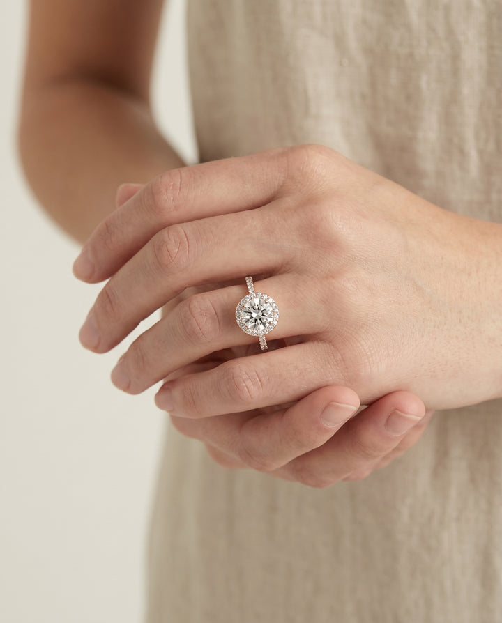 Round Brilliant, Classic French Pavé Halo Round, in 14K Rose Gold, pave setting – lifestyle shot | RockHer