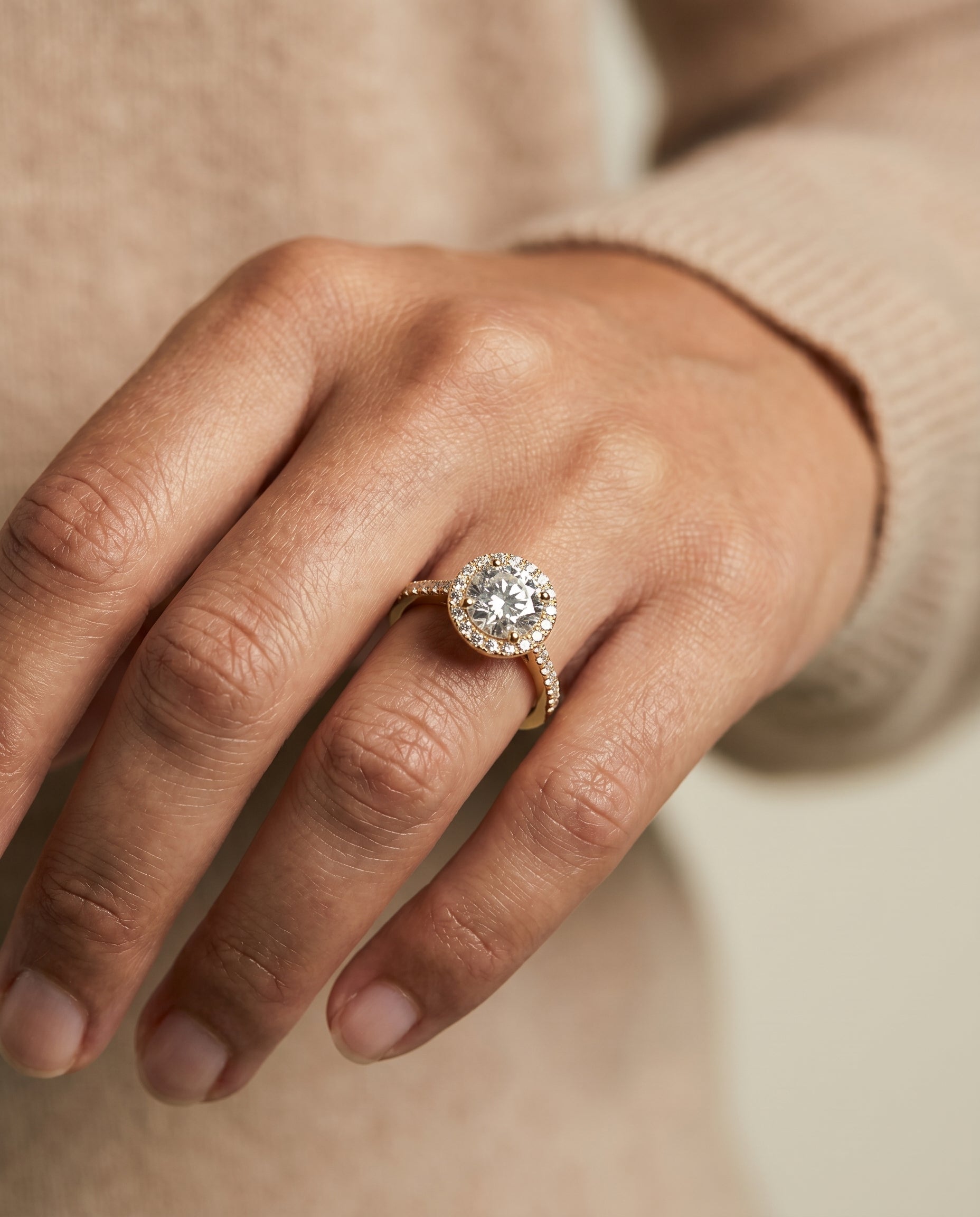 Taylor Select Pavé Halo Round Lab Diamond Engagement Ring in 18K Yellow Gold, shown on hand, angled | RockHer