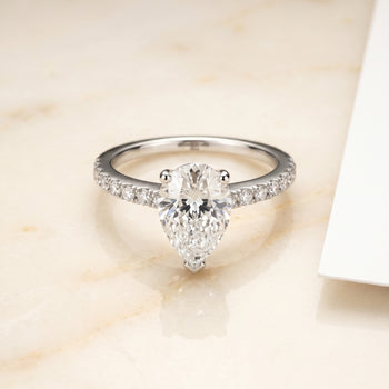 The Norah Classic Linear French Pavé Pear Engagement Ring Setting in Platinum