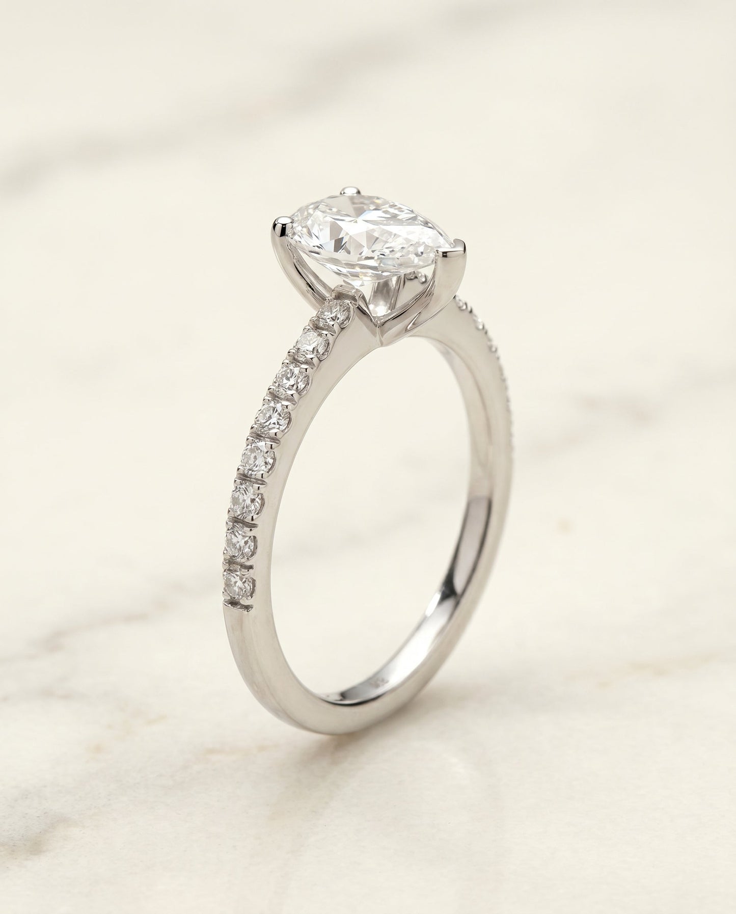 Norah Select Classic Linear French Pave Pear Shape Solitaire in Platinum – view 2