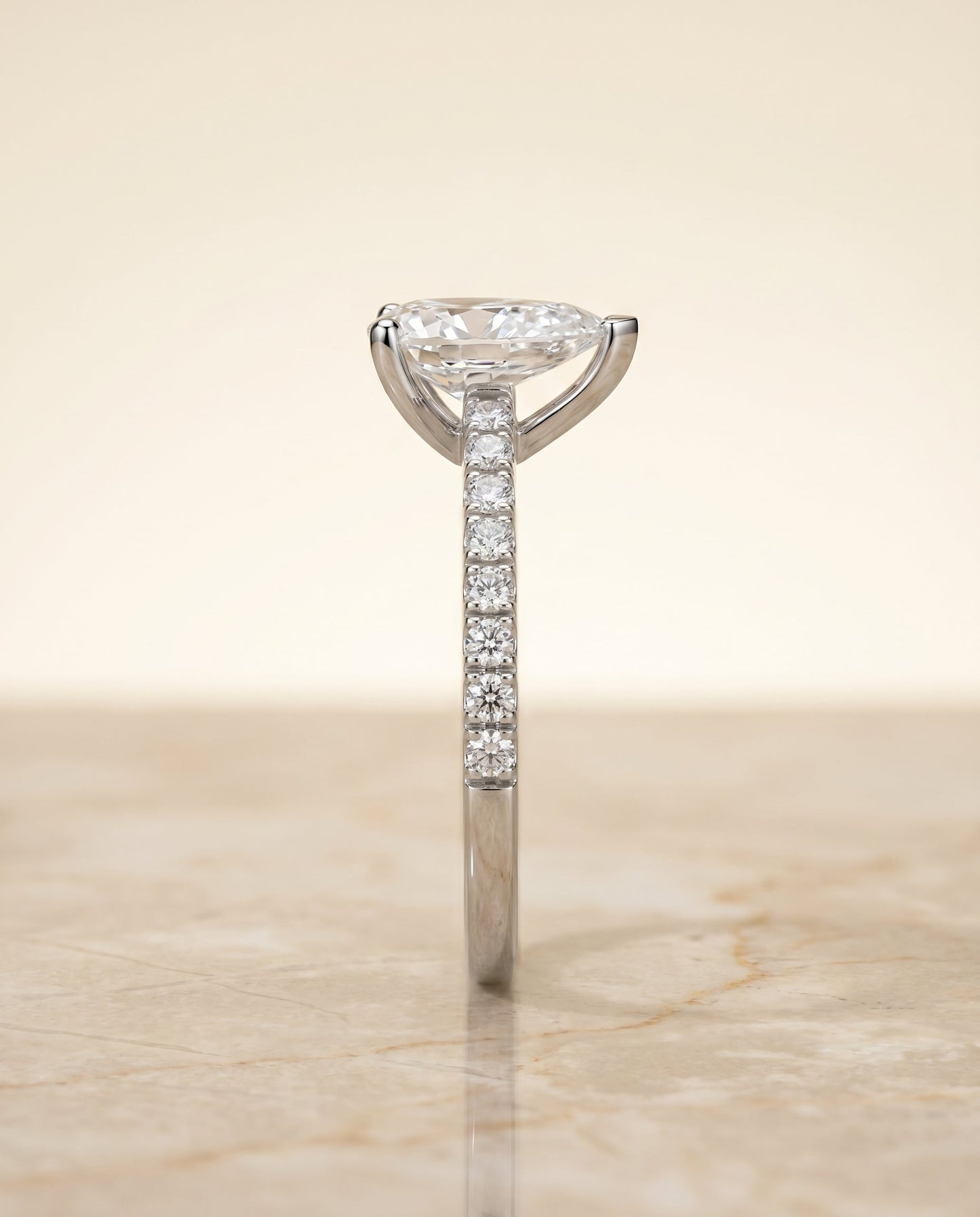 Norah Select Classic Linear French Pave Pear Shape Solitaire in Platinum – view 6