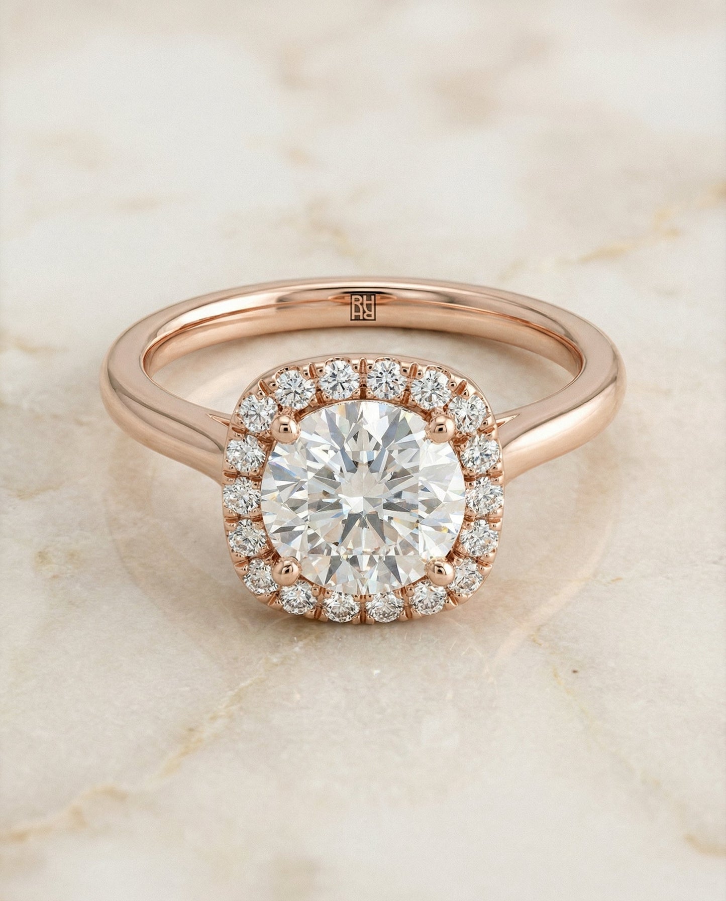 Carnie Select classic prong diamond halo round ring in 14K Rose Gold — alt angle — RockHer
