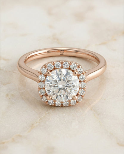 Carnie Select classic prong diamond halo round ring in 14K Rose Gold — alt angle — RockHer