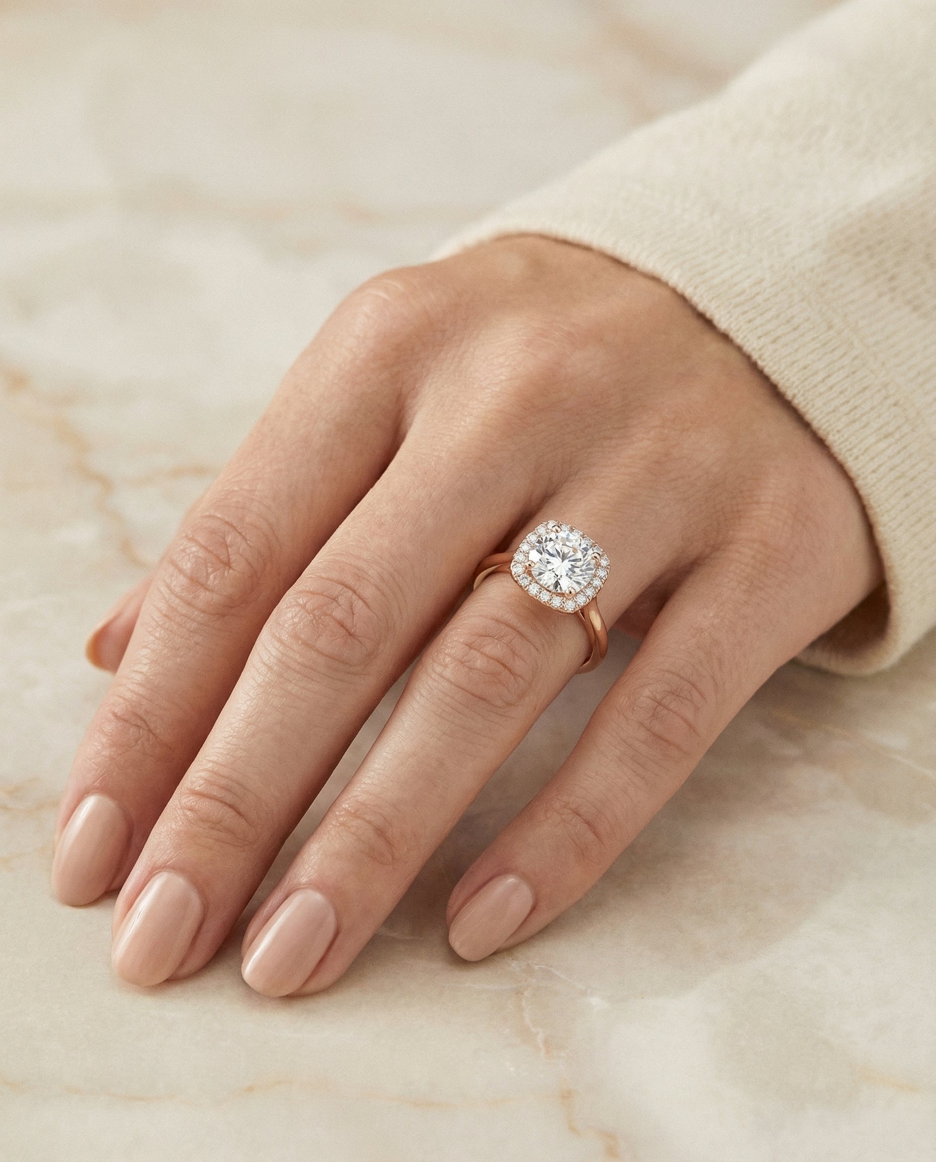 The Carnie engagement ring setting in 14K Rose Gold, classic prong diamond halo design | RockHer