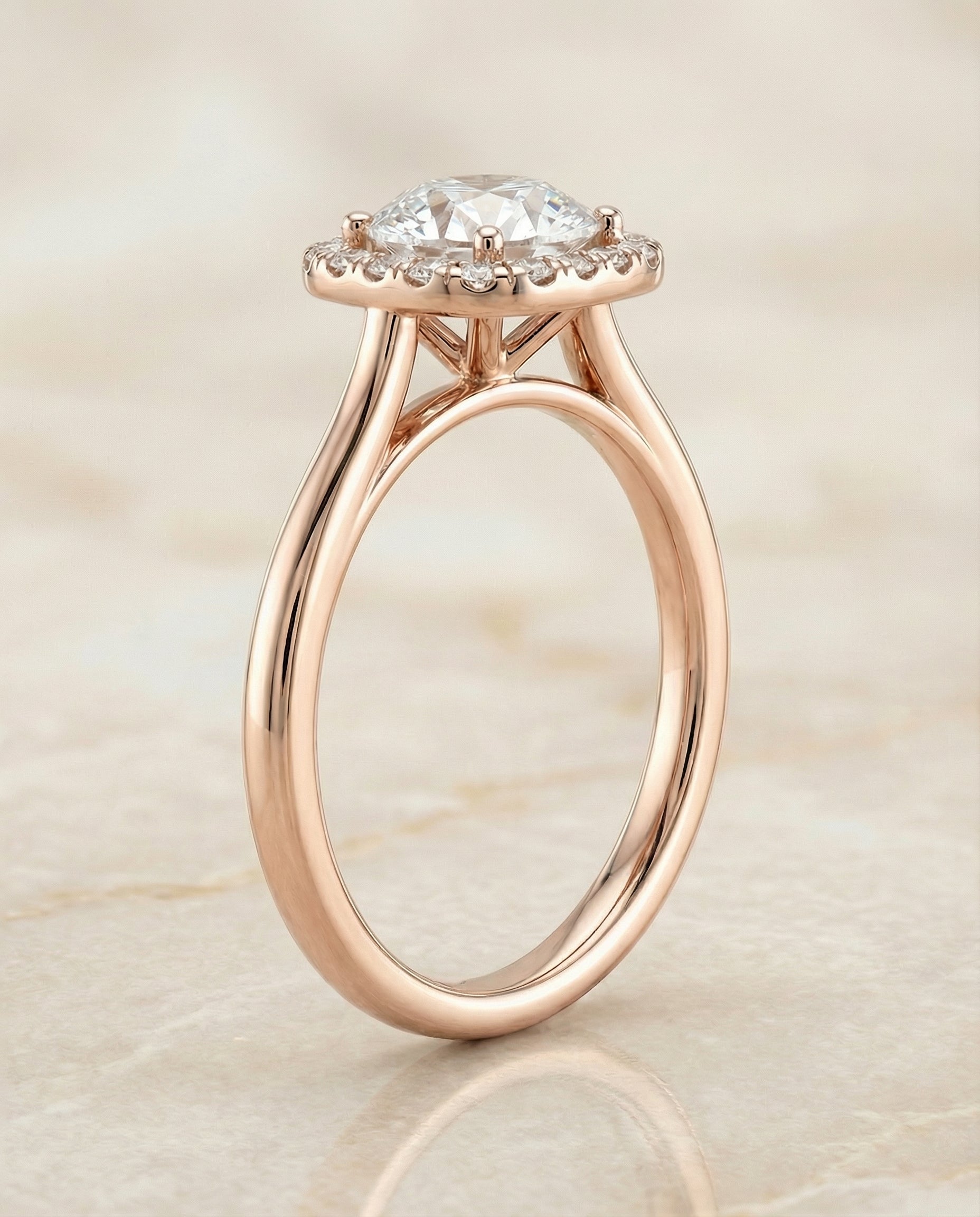 The Carnie classic prong diamond halo engagement ring setting, shown in 14K Rose Gold | RockHer