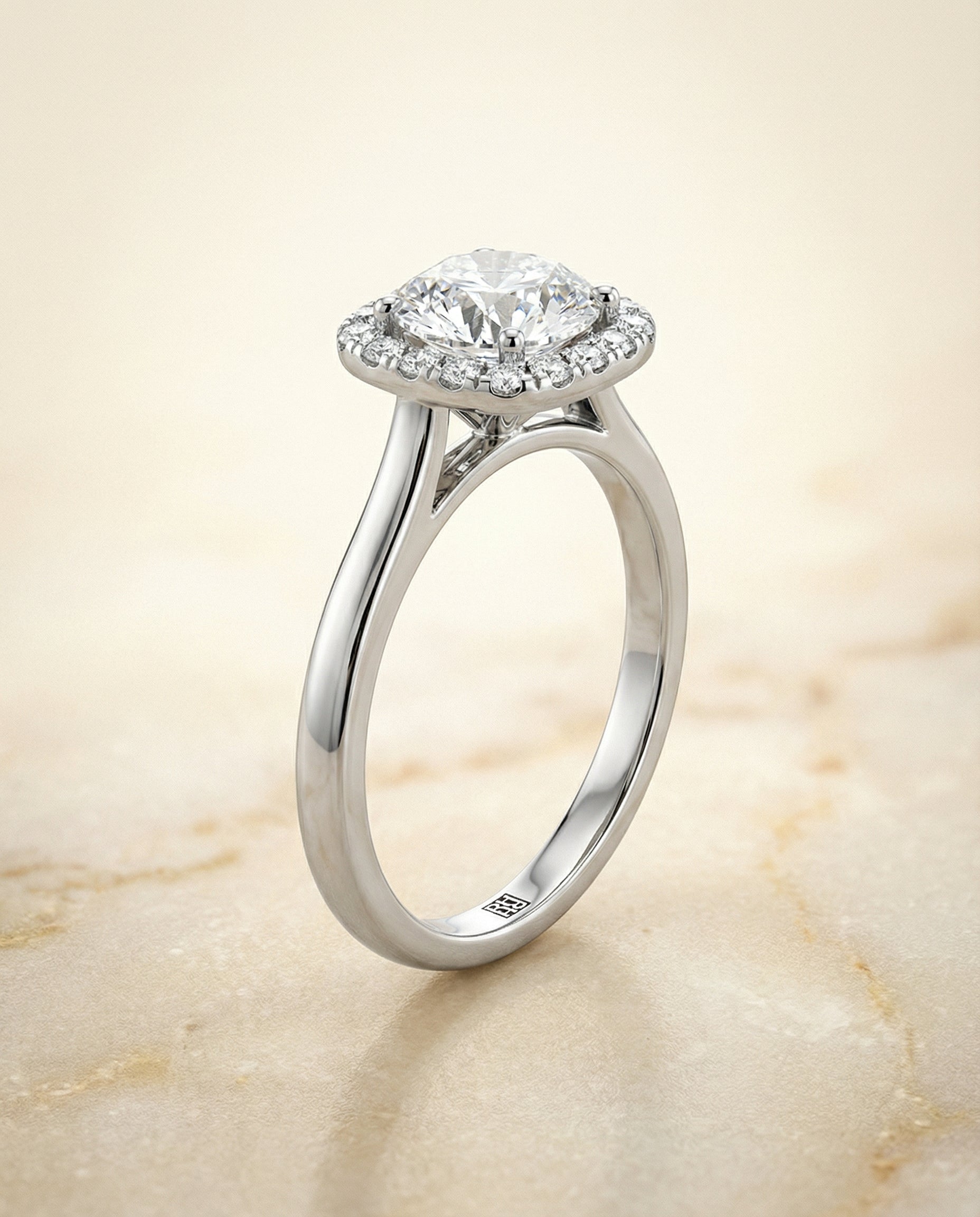 Classic Prong Diamond Halo styling on The Carnie round engagement ring setting | RockHer