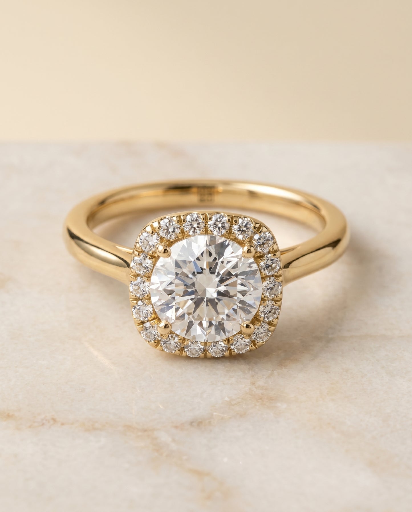 Round Brilliant, Classic Prong Diamond Halo, in 18K Yellow Gold, pave setting – angled view | RockHer