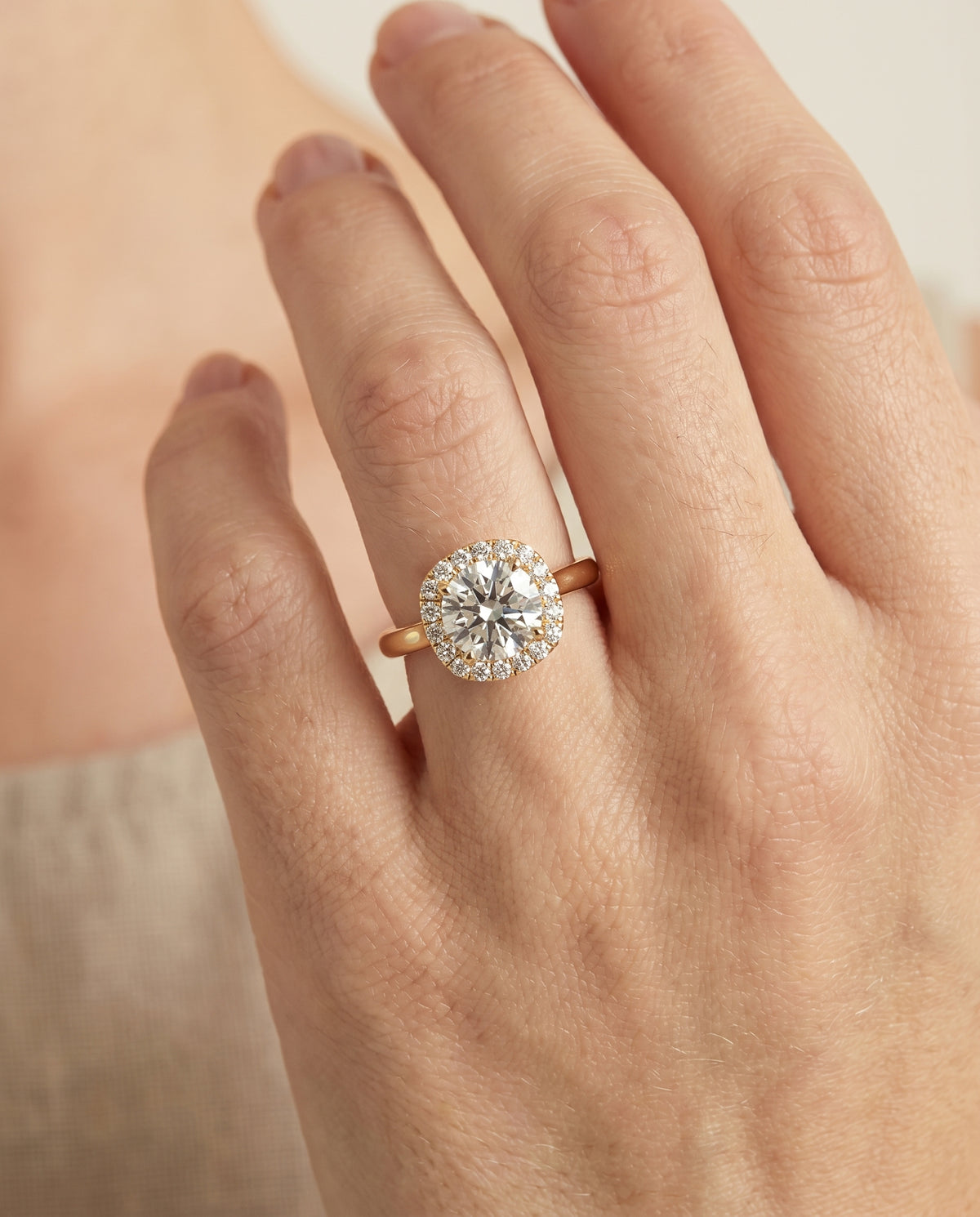 The Carnie setting for round diamonds, made to order in 18K Yellow Gold | RockHer
