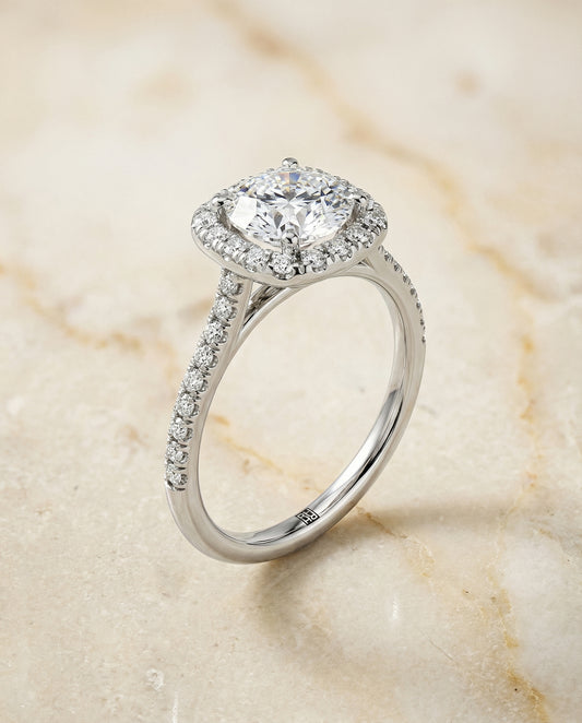 Round Brilliant, Classic Prong Halo, in Platinum, pave setting – front view | RockHer