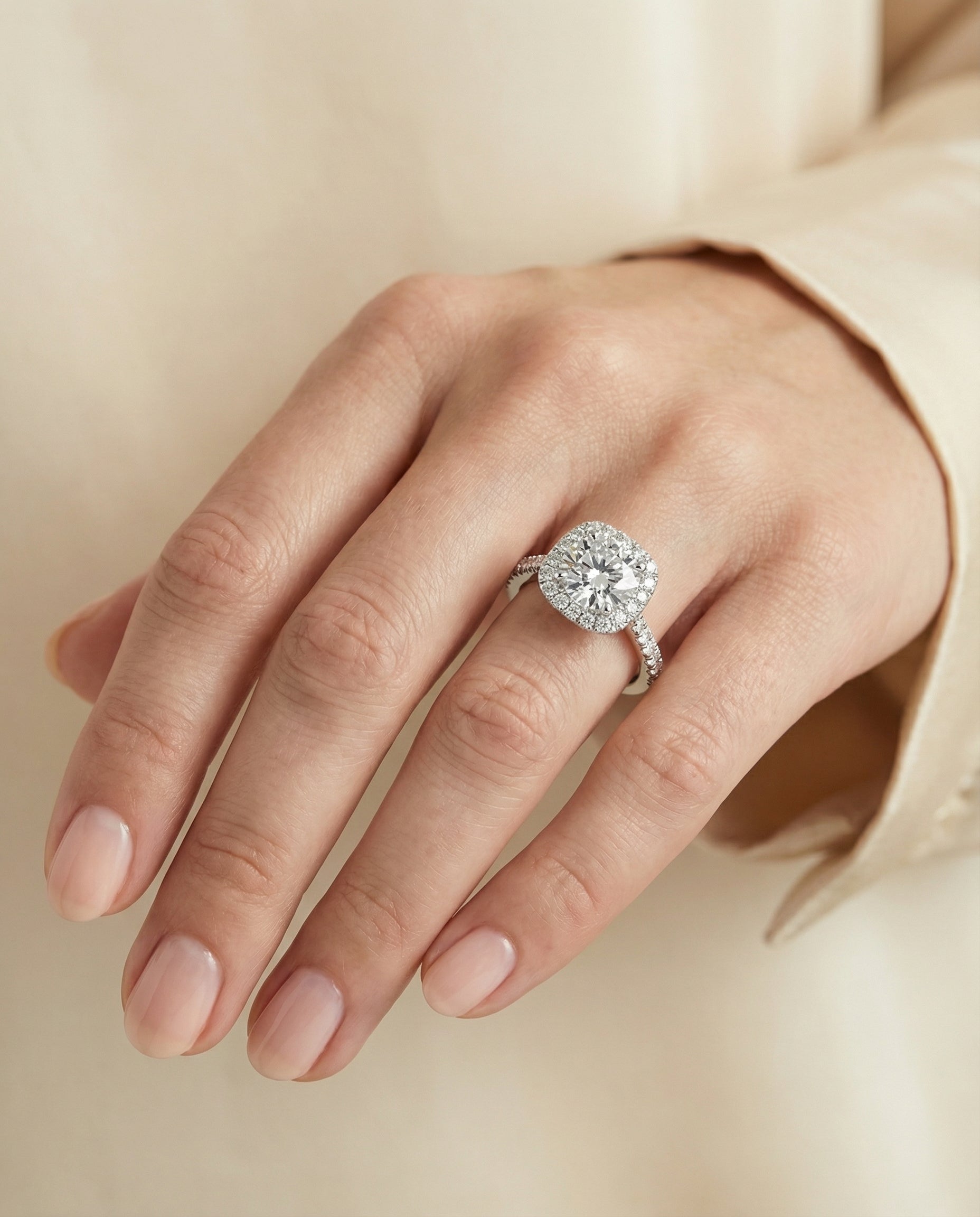 Bianca Select Classic Prong Halo Round Lab Diamond Engagement Ring in 18K White Gold, shown on hand, angled | RockHer