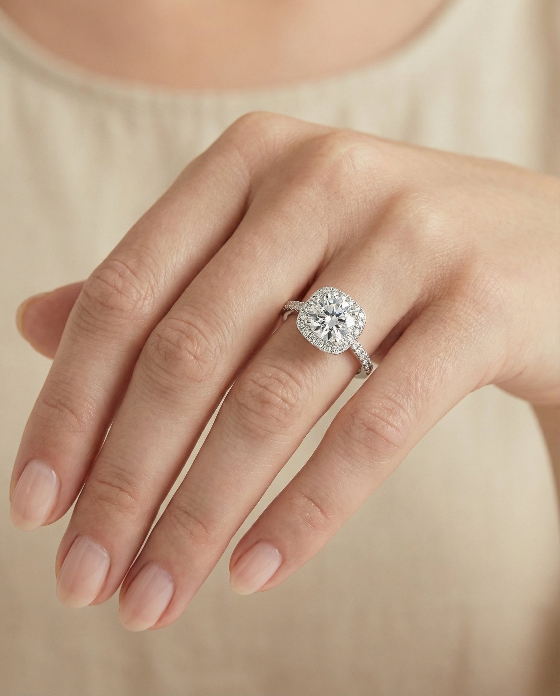 The Bianca classic prong halo engagement ring setting, shown in Platinum | RockHer