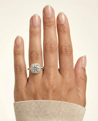 Round Brilliant, Classic Prong Halo, in 18K Yellow Gold, pave setting – lifestyle shot | RockHer