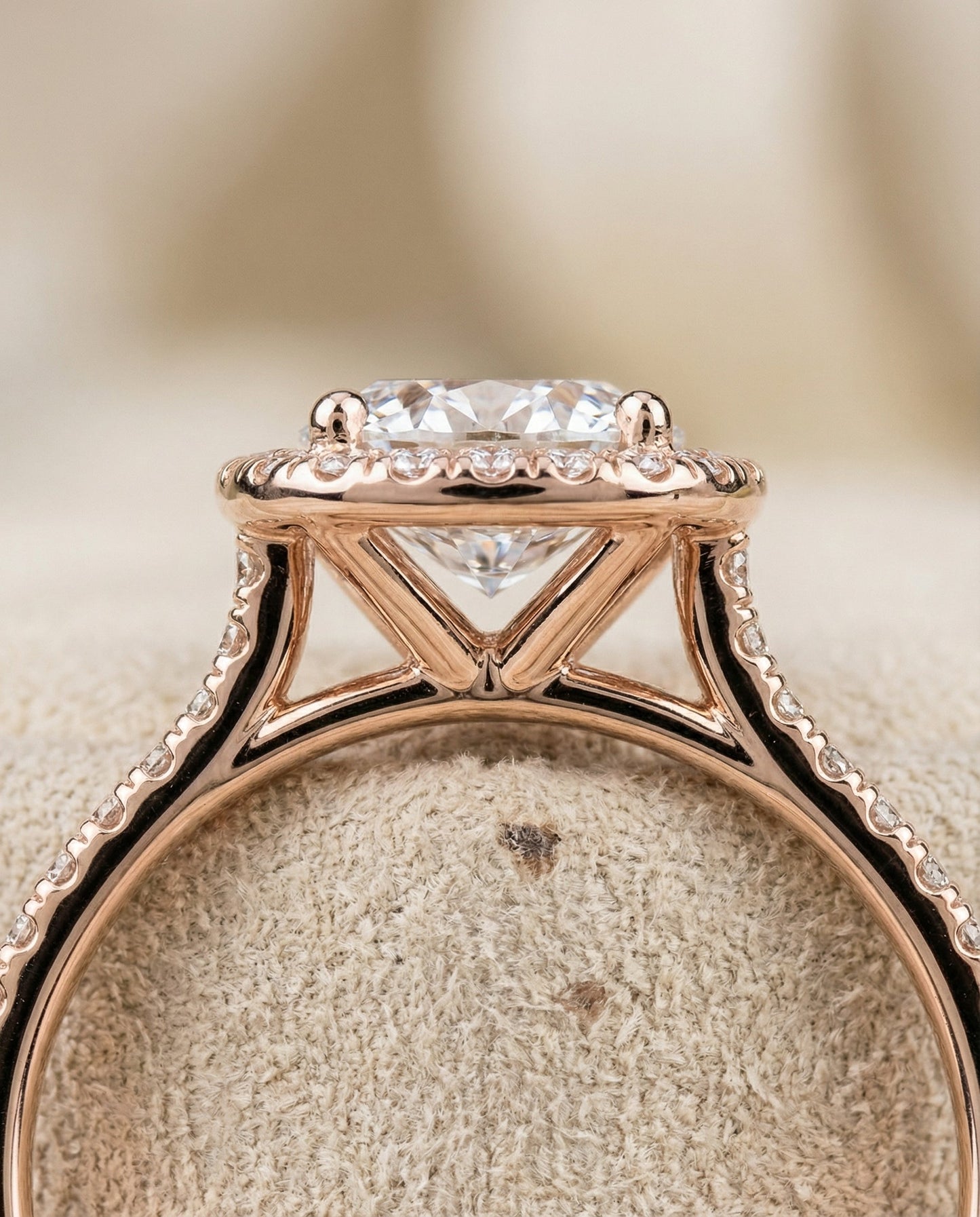 Everly Select classic shared prong halo round ring in 14K Rose Gold — detail — RockHer
