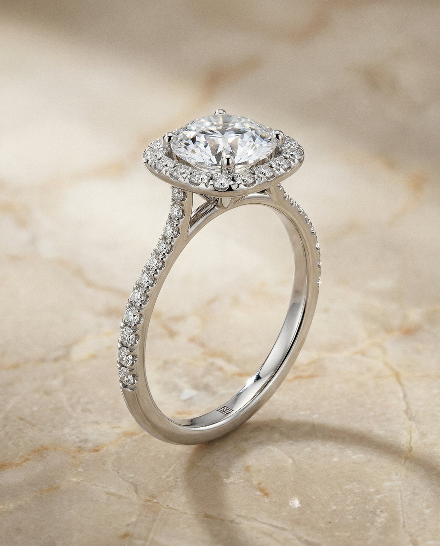 Classic Shared Prong Halo styling on The Everly round engagement ring setting | RockHer