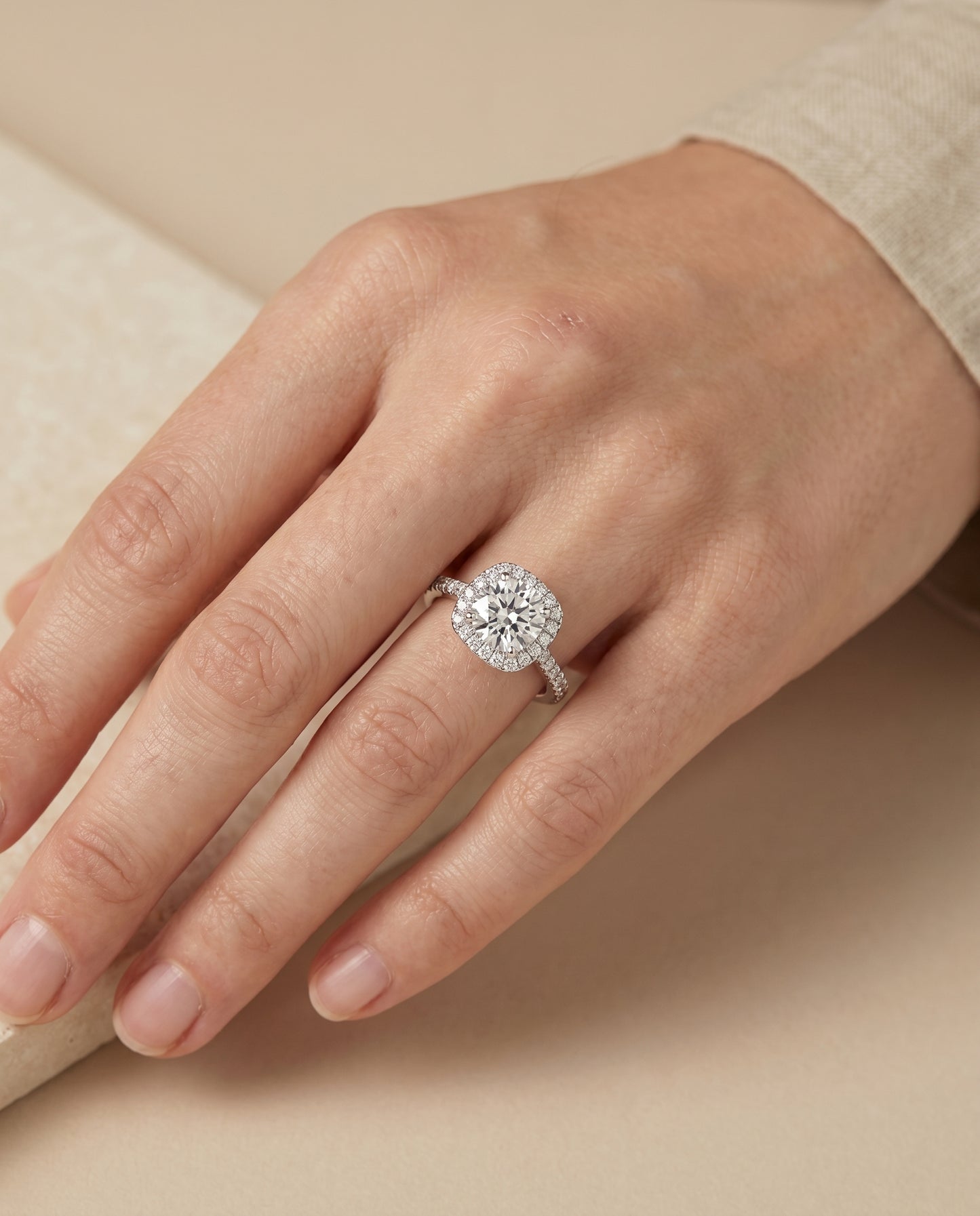 Round Brilliant, Classic Shared Prong Halo Round, in Platinum, pave setting – lifestyle shot | RockHer