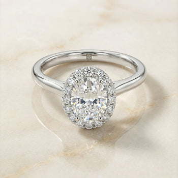 The Etta Classic Shared Prong Halo Oval Engagement Ring Setting in 18K White Gold