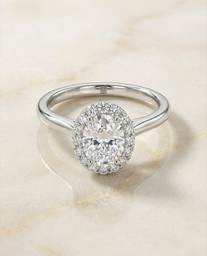 Classic Shared Prong Halo Oval, in Platinum, pave setting – angled view | RockHer