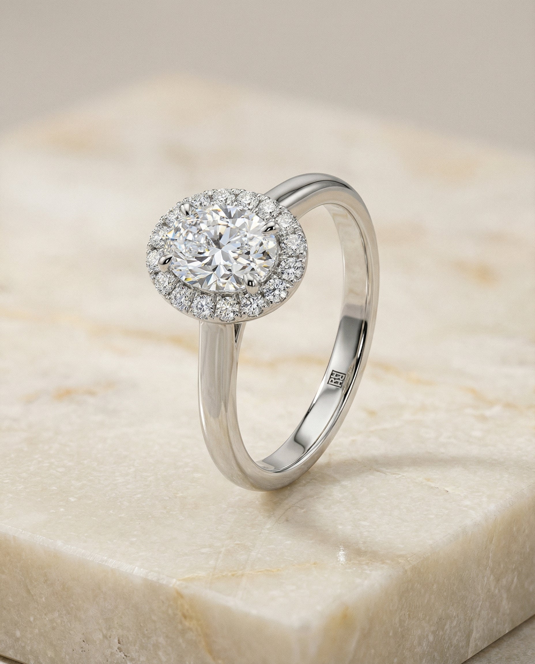 Classic Shared Prong Halo styling on The Etta oval engagement ring setting | RockHer