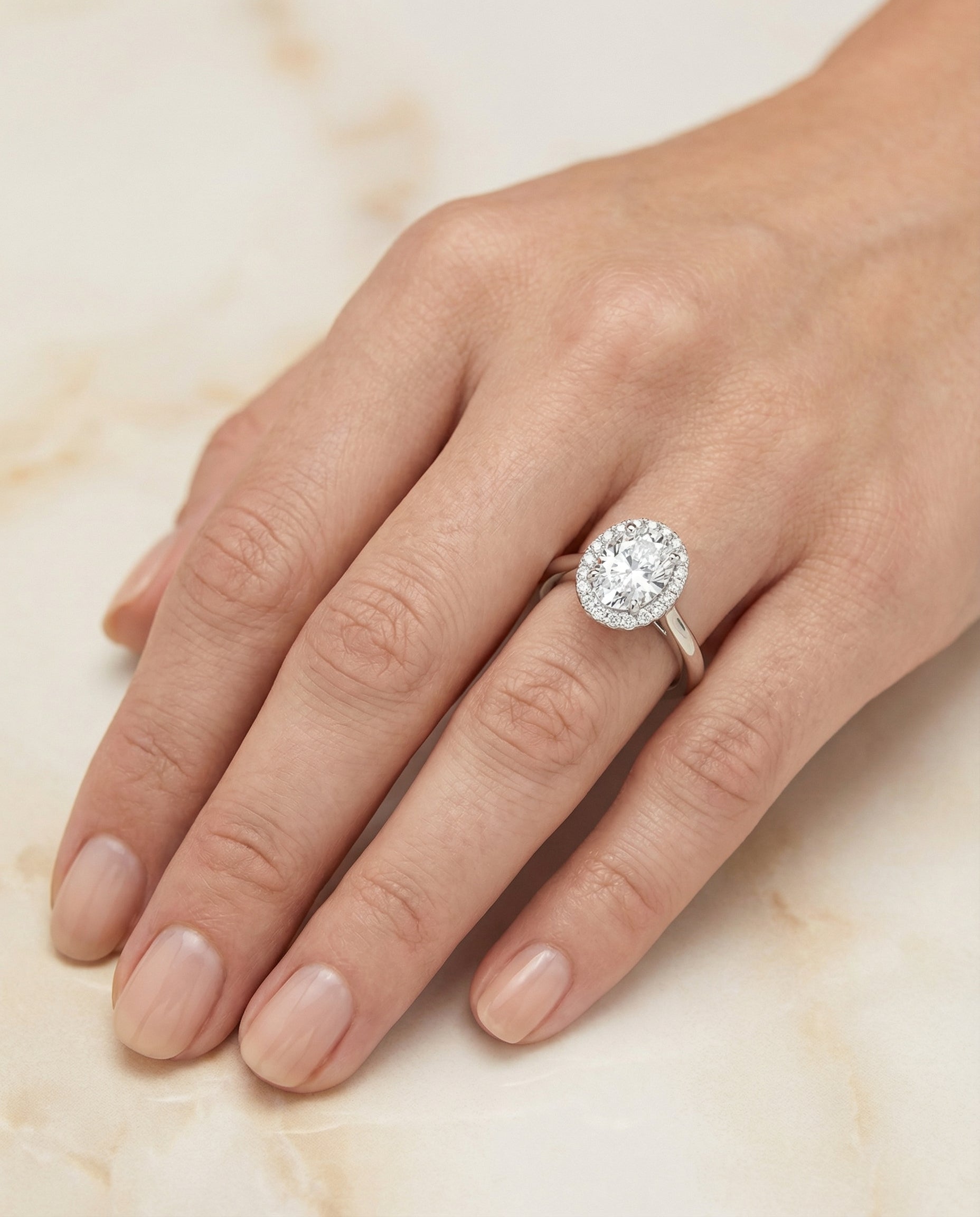The Etta engagement ring setting in Platinum, classic shared prong halo design | RockHer