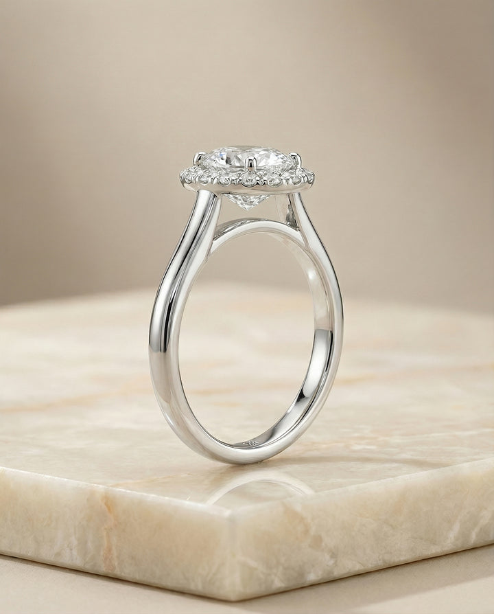 Classic Shared Prong Halo Oval, in Platinum, pave setting – side profile | RockHer