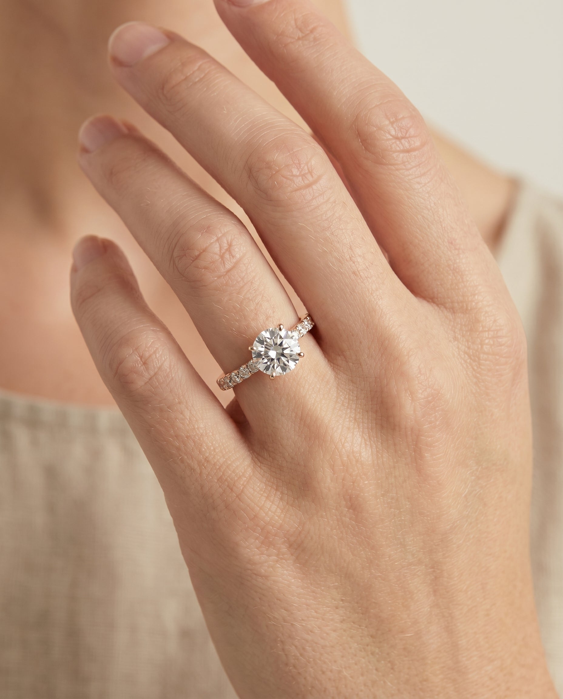 Olivia Select Pavé Round Lab Diamond Engagement Ring in 14K Rose Gold, shown on hand | RockHer