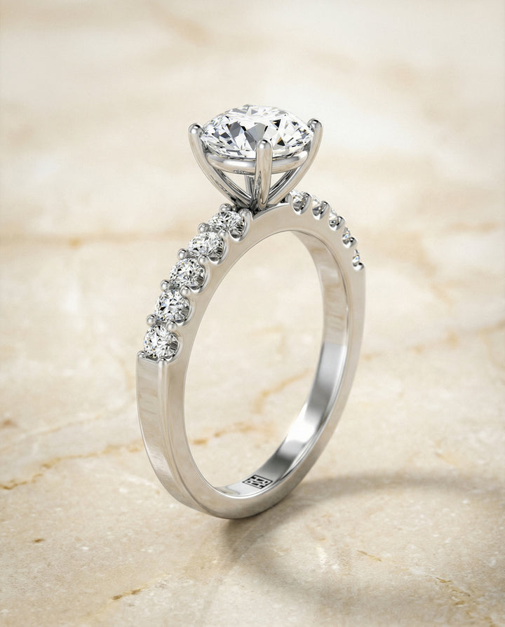 Round Brilliant, Classic Shared Prong Linear Pavé, in Platinum – front view | RockHer
