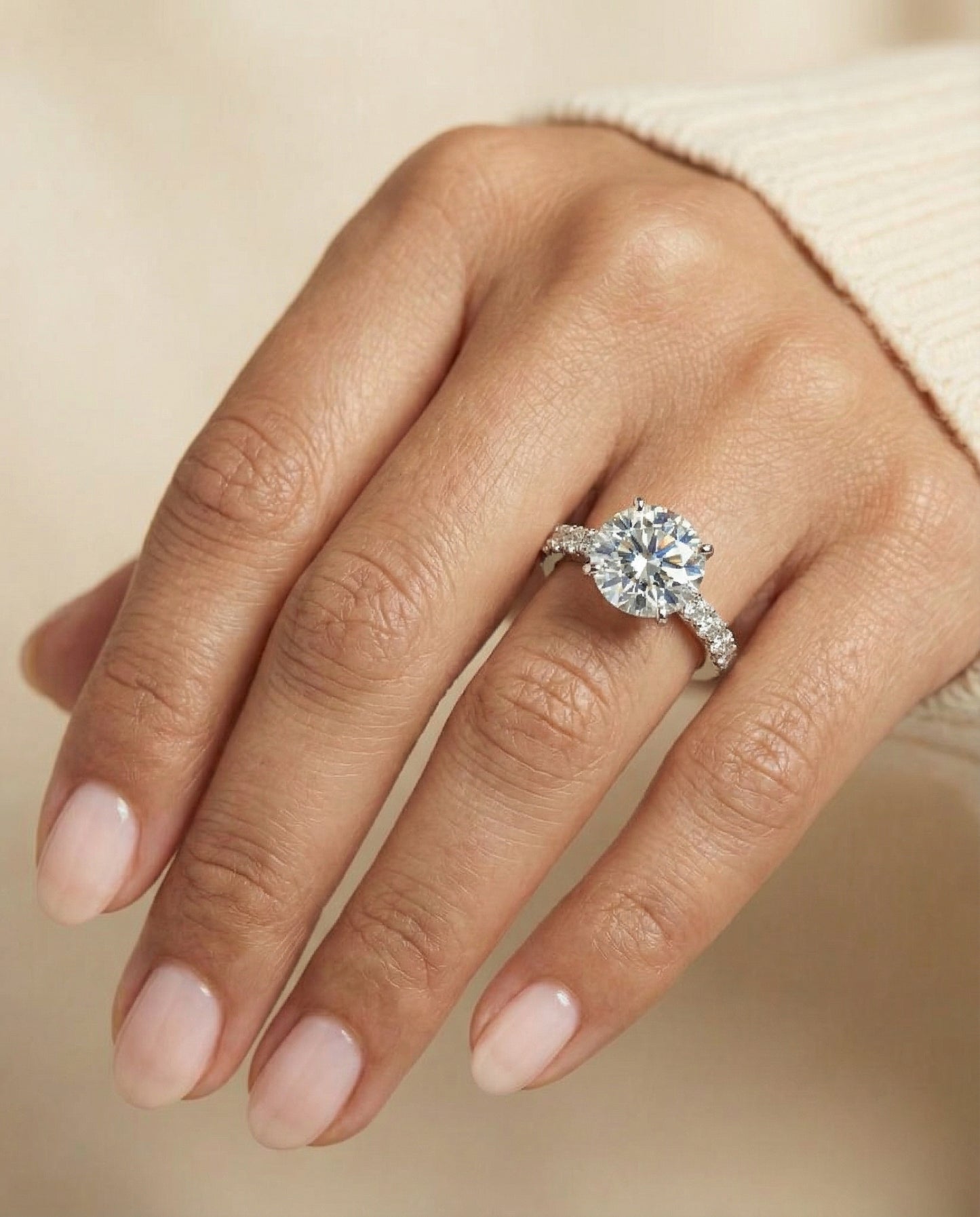 Round Brilliant, Classic Shared Prong Linear Pavé, in Platinum – lifestyle shot | RockHer