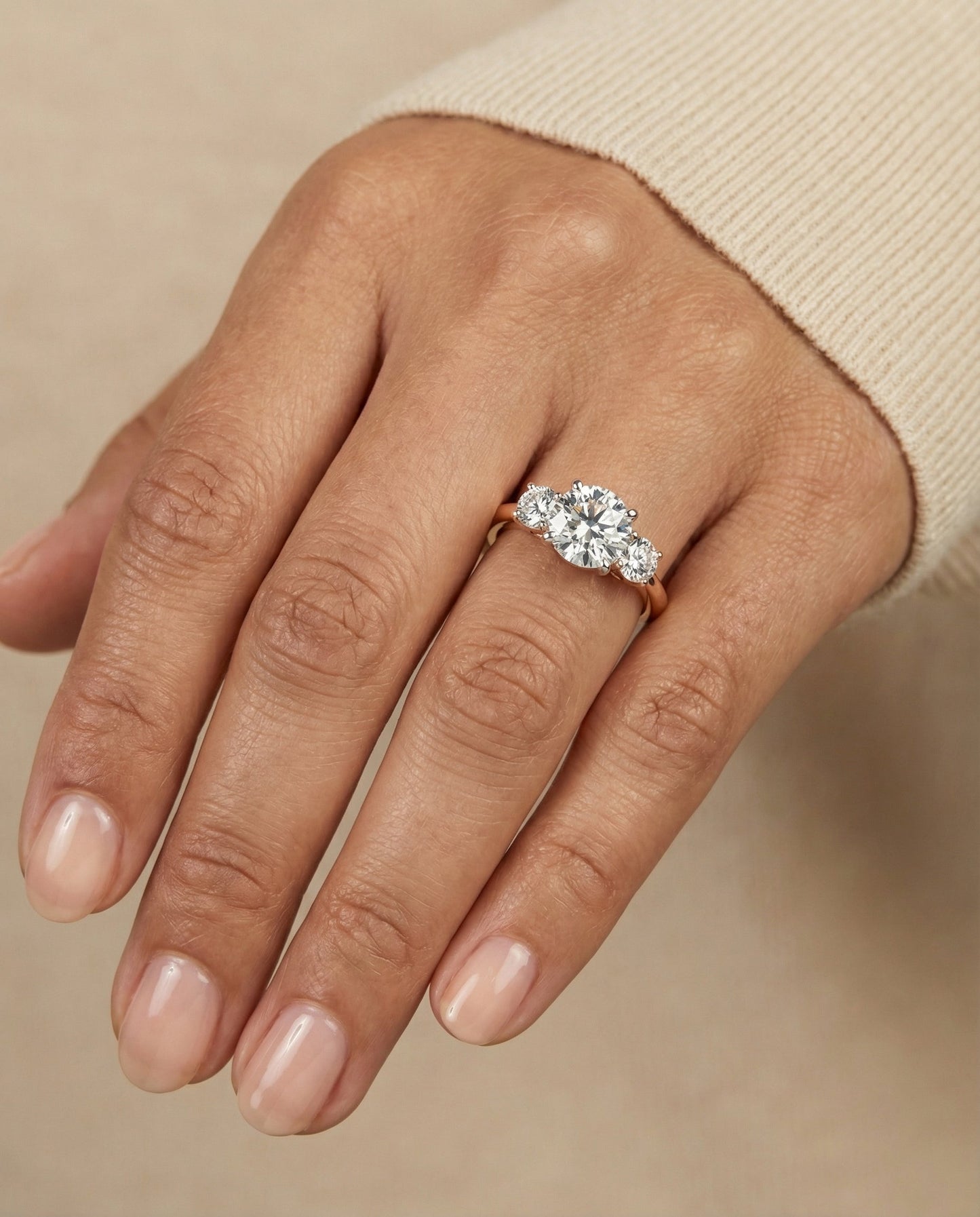 Anita Select classic three stone round ring in 14K Rose Gold — front — RockHer