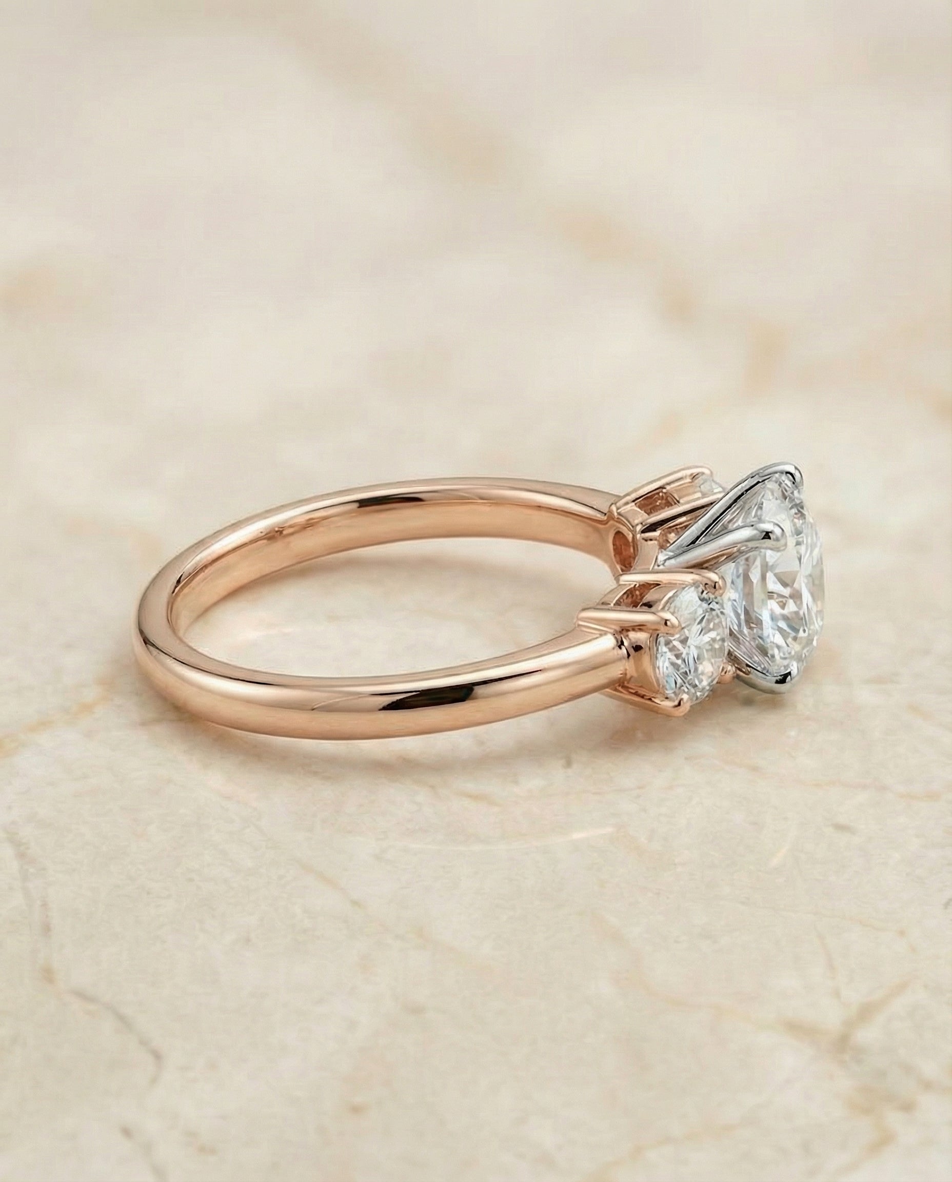 Select Classic Three Stone styling on The Anita round engagement ring setting | RockHer