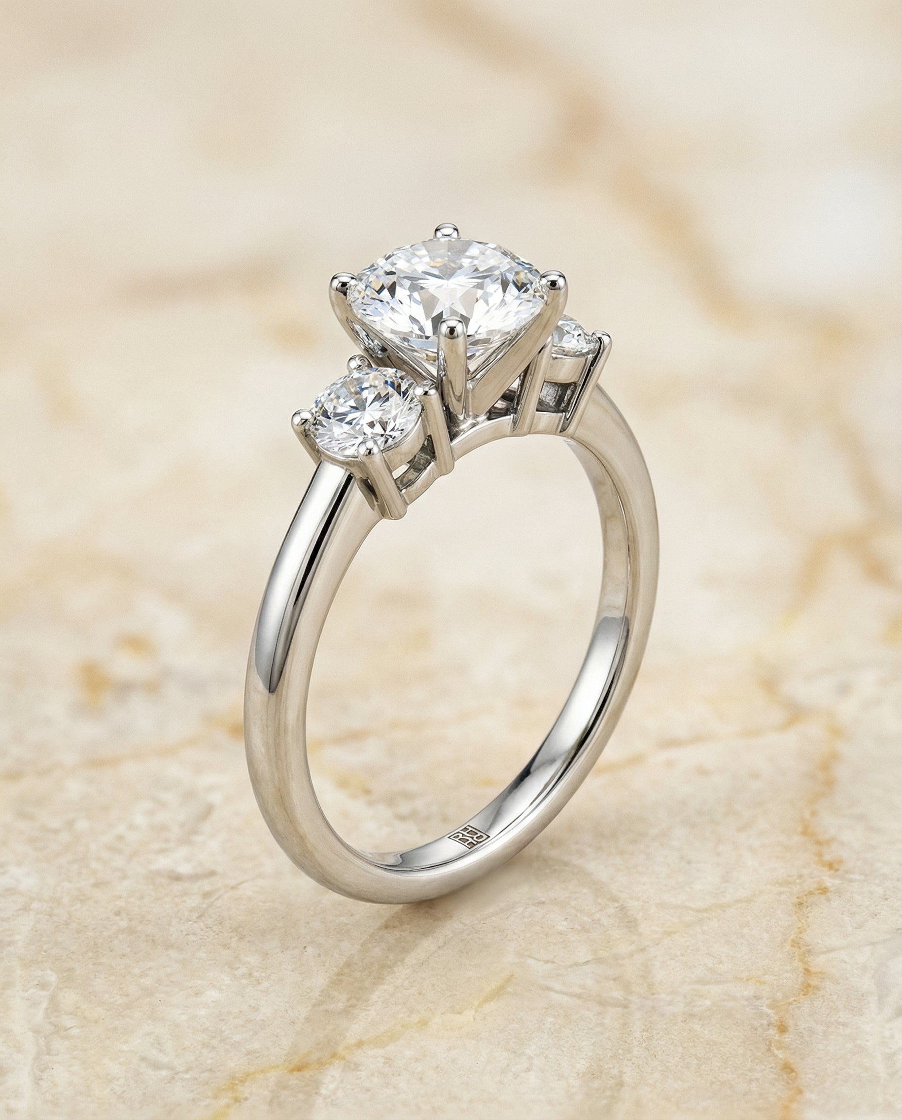 Classic Three Stone styling on The Anita round engagement ring setting | RockHer