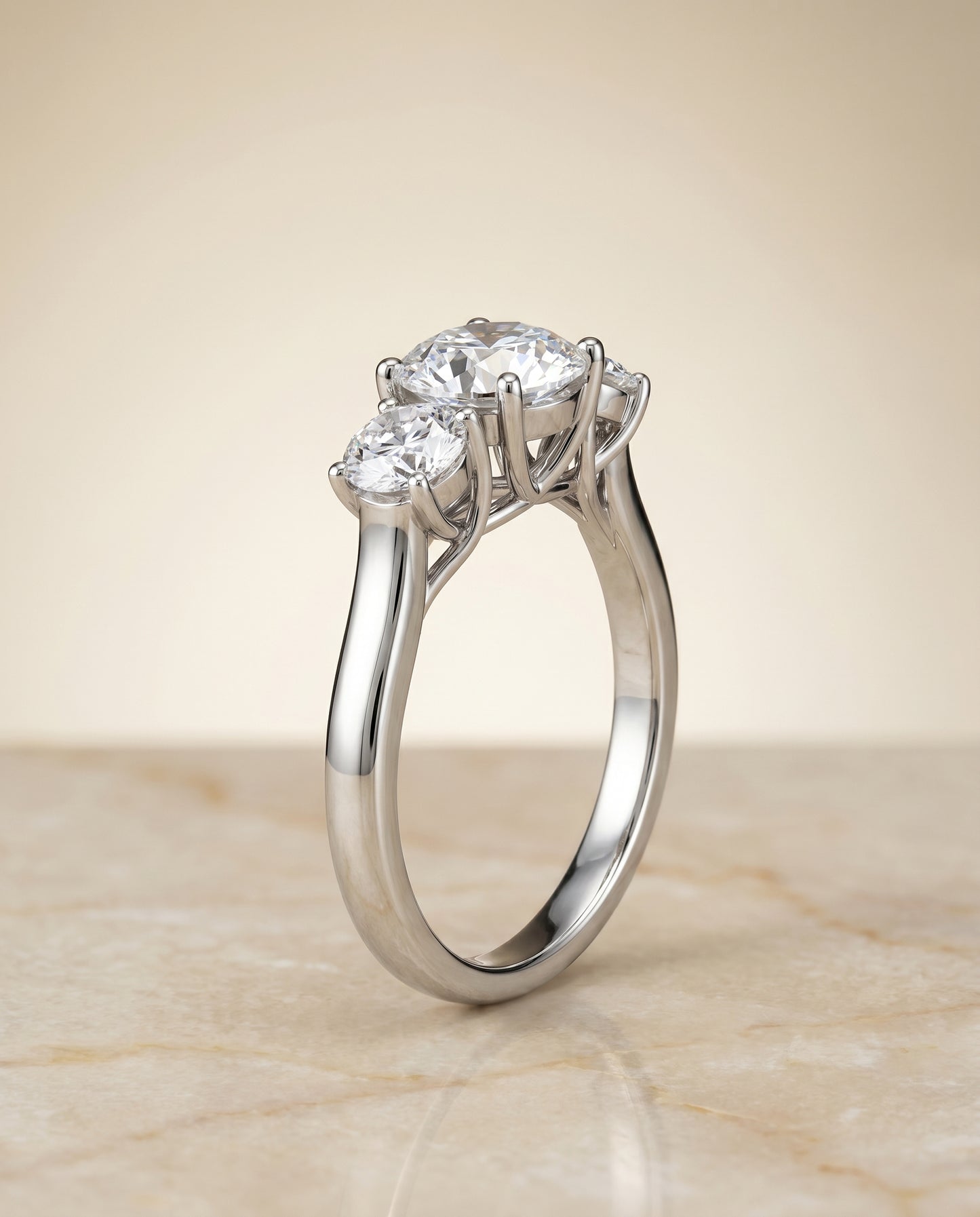 Round Brilliant, Classic Three Stone Round, in Platinum, pave setting – front view | RockHer