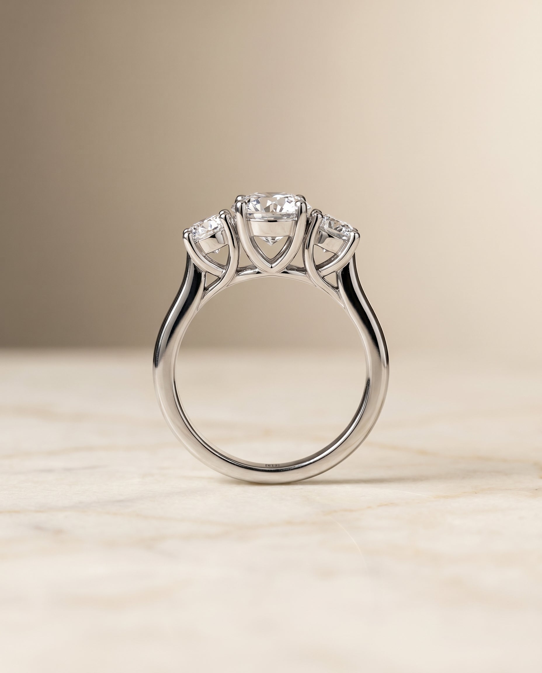 The Natalie classic three stone engagement ring setting, shown in Platinum | RockHer