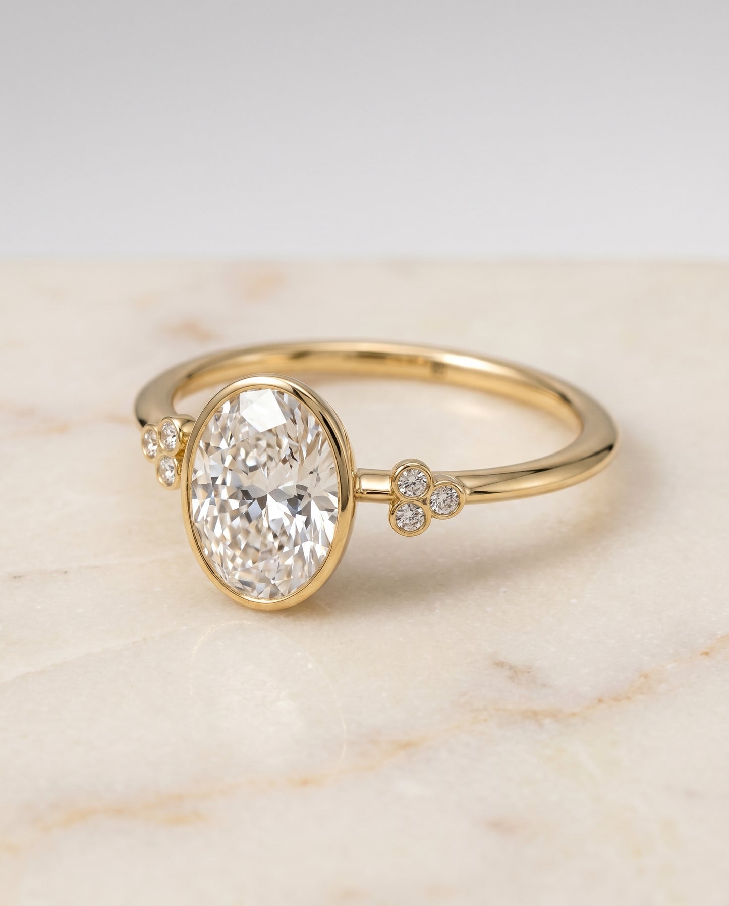 The Selena Bezel Solitaire Engagement Ring Setting for Oval Diamonds in 18K Yellow Gold | RockHer