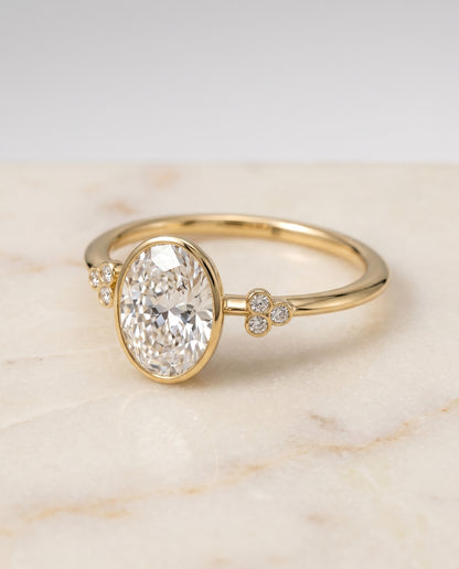 The Selena Bezel Solitaire Engagement Ring Setting for Oval Diamonds in 18K Yellow Gold | RockHer
