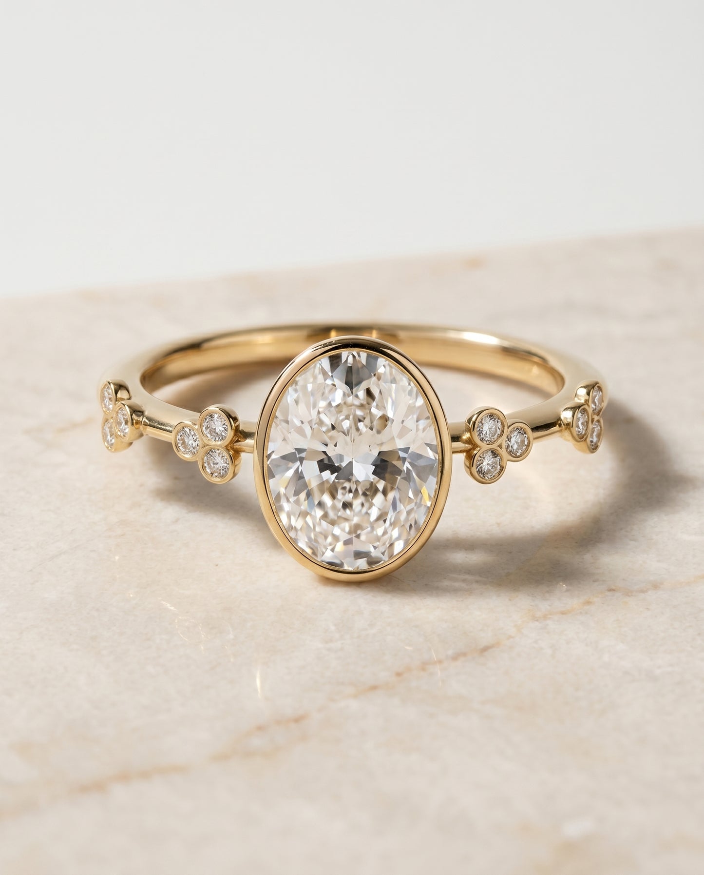 The Miley Bezel Solitaire Engagement Ring Setting for Oval Diamonds in 18K Yellow Gold | RockHer