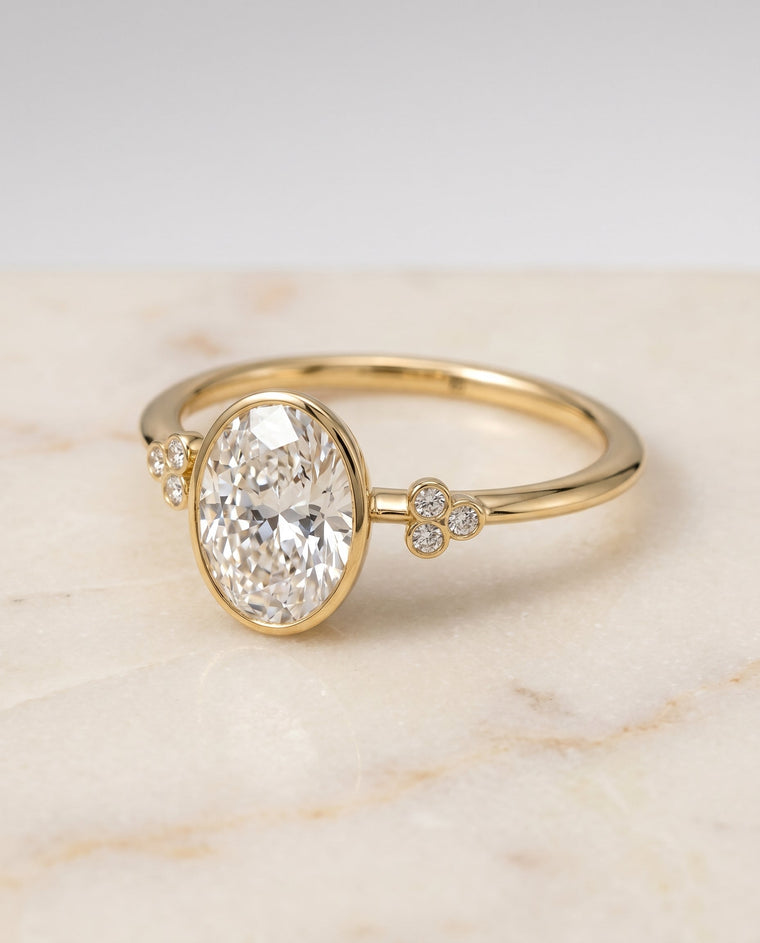 The Selena Select Bezel Solitaire Oval Lab Diamond Engagement Ring in 18K Yellow Gold
