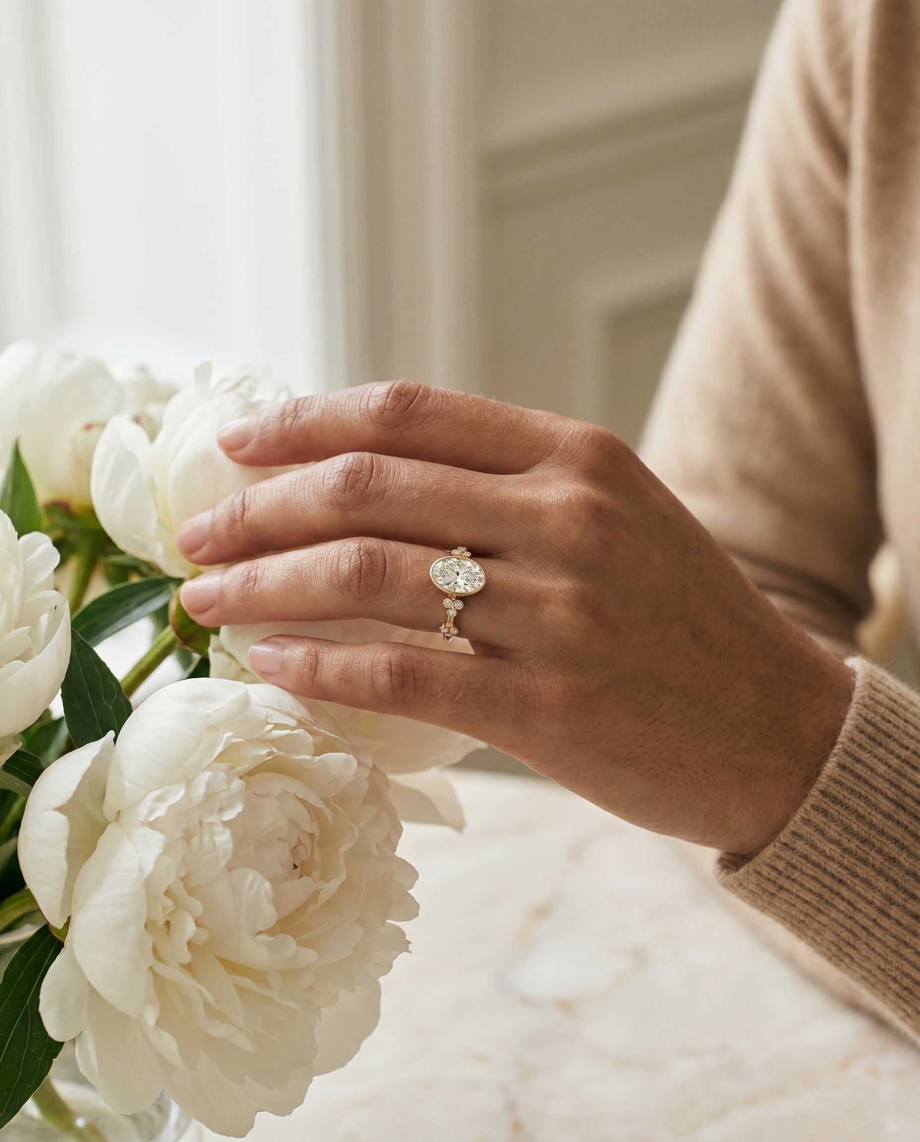 Miley Select Clover Bezel Accent Solitaire Oval Lab Diamond Engagement Ring in 18K Yellow Gold, lifestyle | RockHer