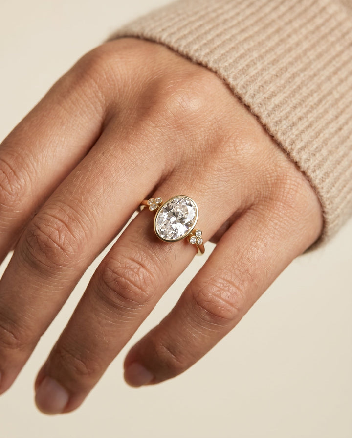 Selena Select 18ky Bezel Set Oval Engagement Ring With 6 Clover Bezel Set Round  – view 3