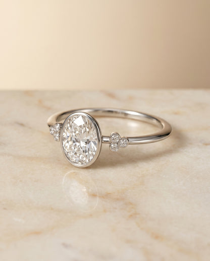 The Selena Bezel Solitaire Engagement Ring Setting for Oval Diamonds in 18K White Gold | RockHer