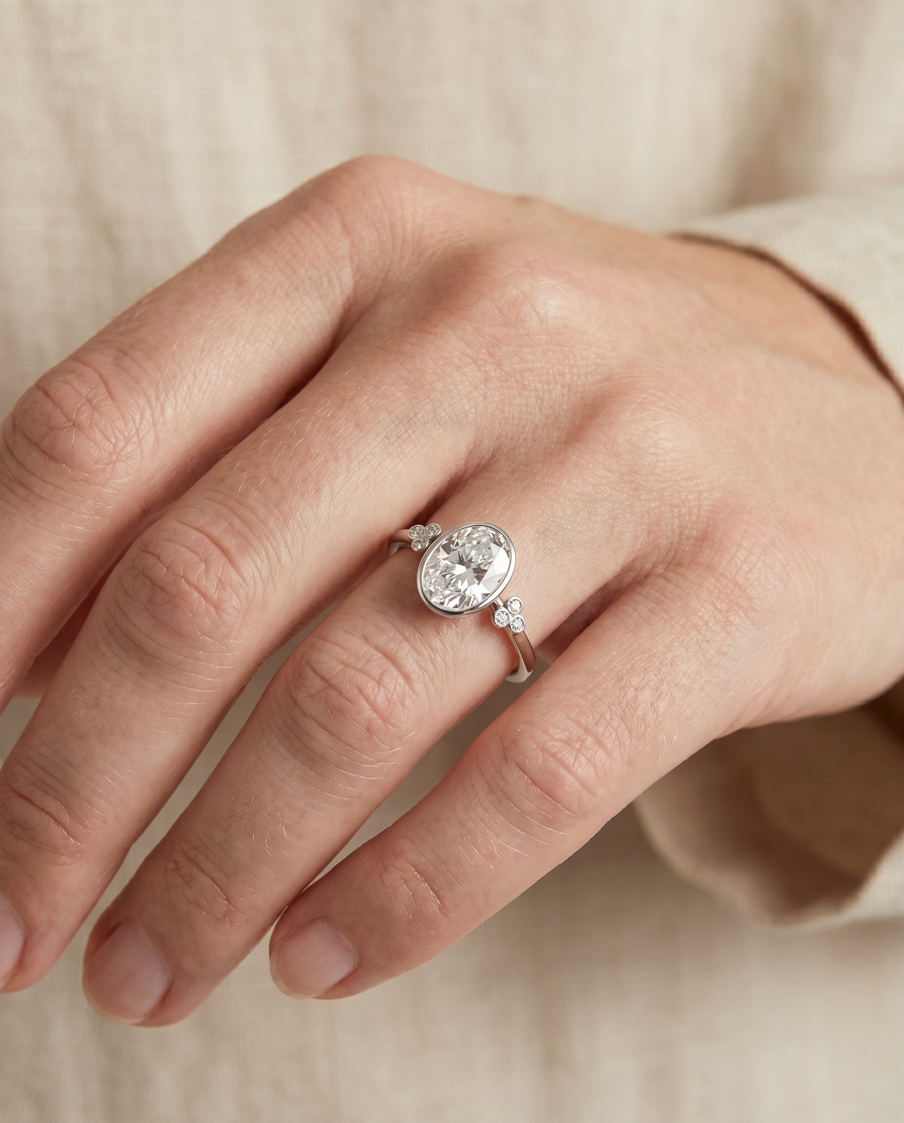 The Selena engagement ring setting in 18K White Gold, clover bezel accent solitaire design | RockHer
