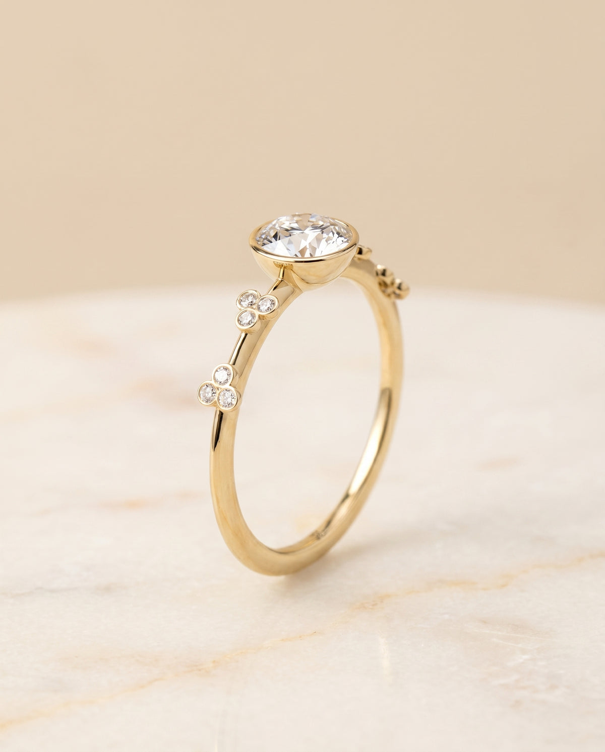 The Miley Bezel Solitaire Engagement Ring Setting for Round Diamonds in 18K Yellow Gold | RockHer