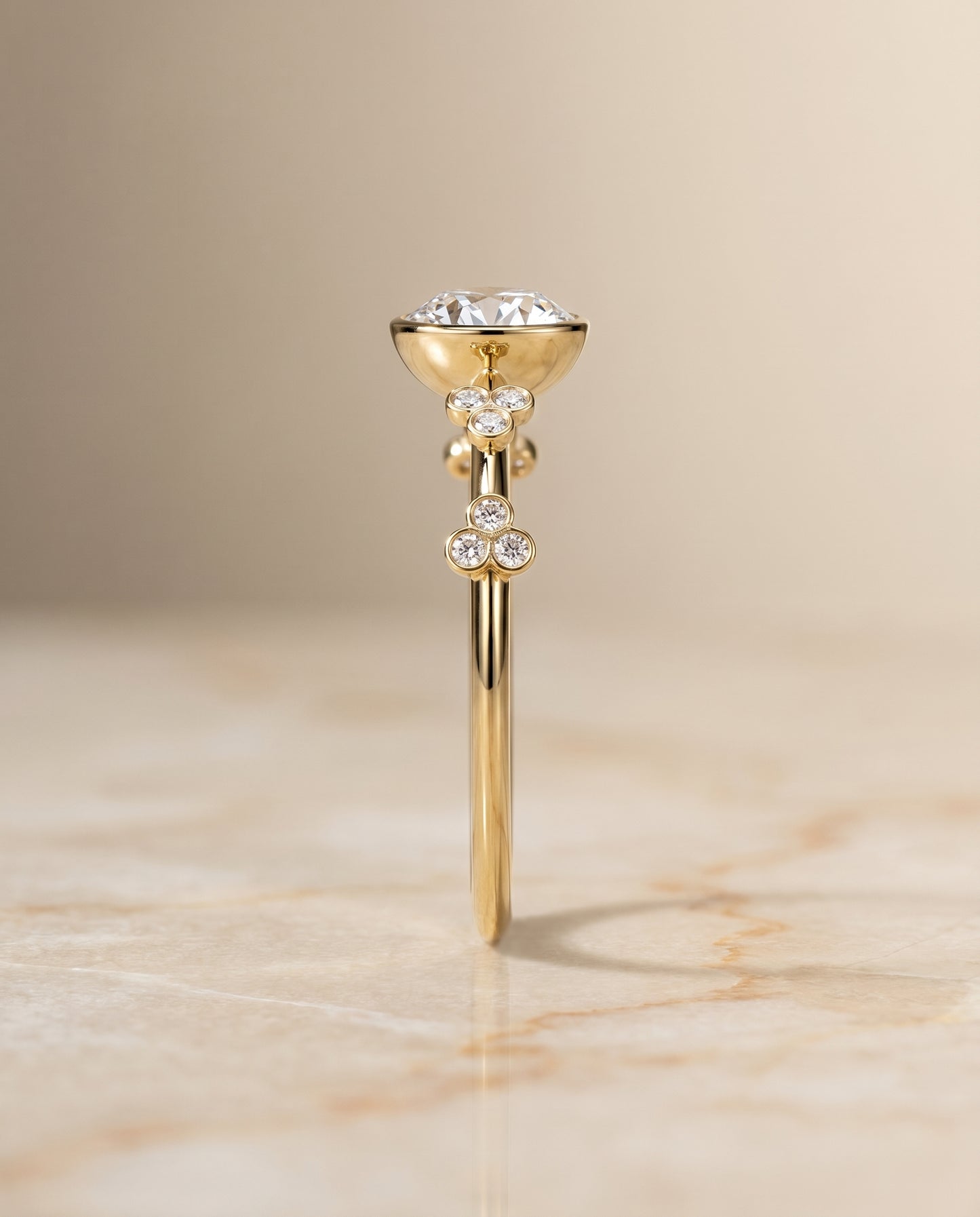 The Miley Solitaire Engagement Ring Setting for Round Diamonds in 18K Yellow Gold