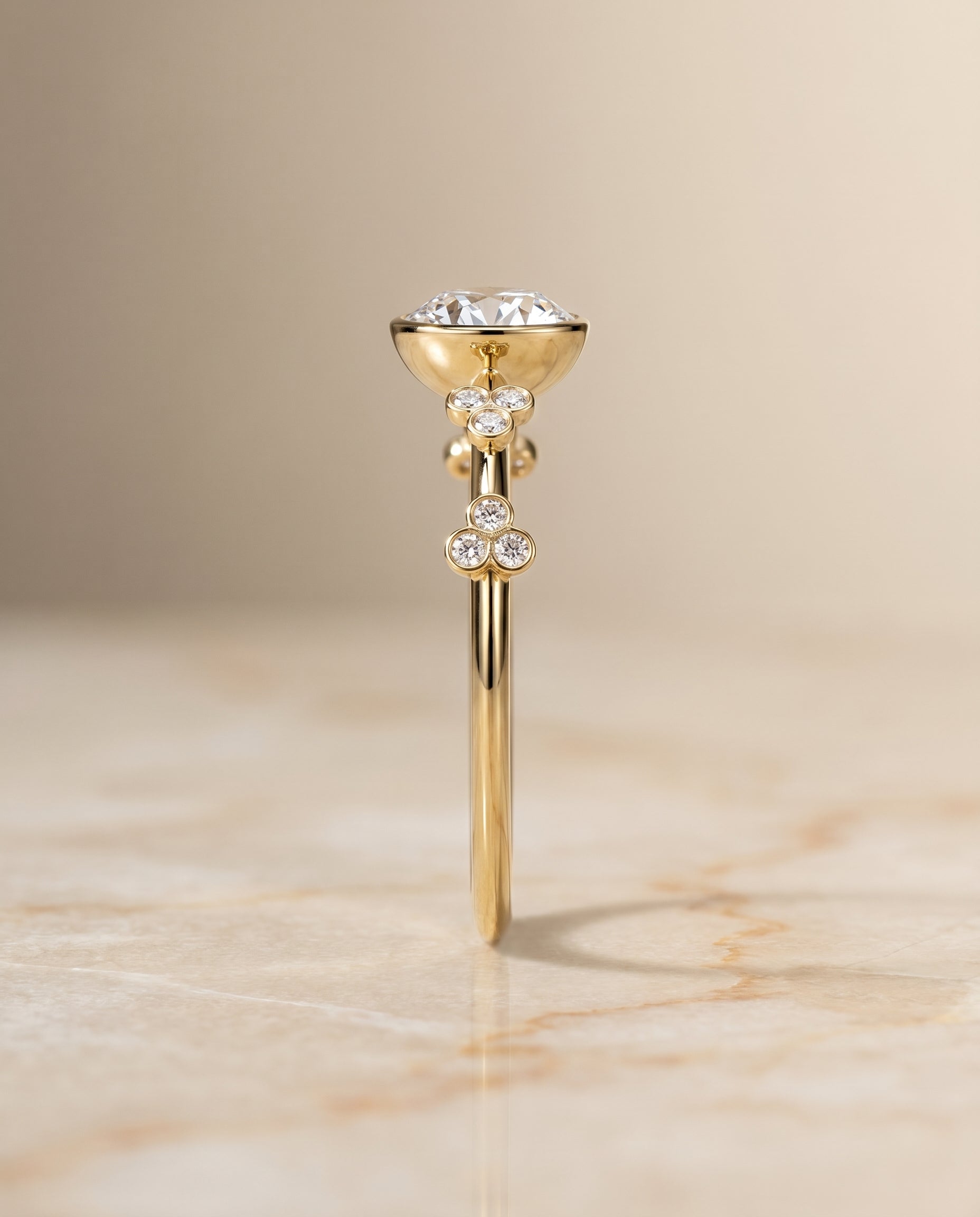 Clover Bezel Accent Solitaire styling on The Miley round engagement ring setting | RockHer