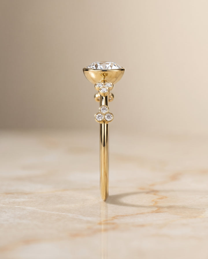 The Miley Solitaire Engagement Ring Setting for Round Diamonds in 18K Yellow Gold