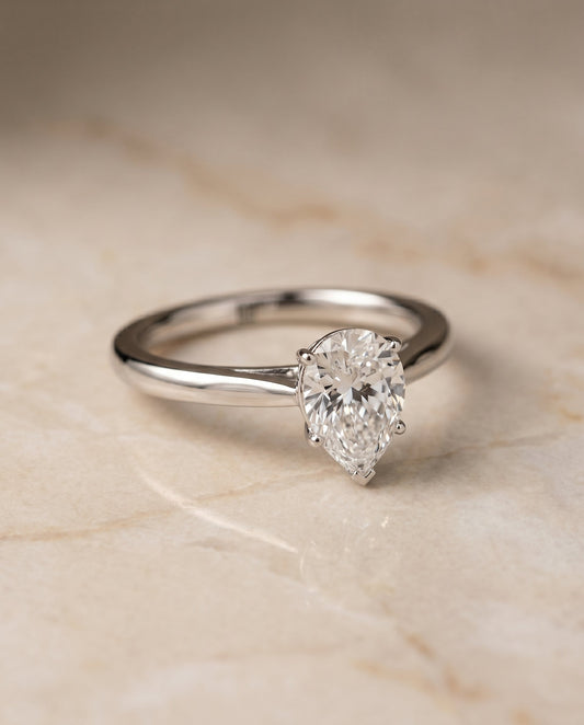 Valerie Select Comfort Fit Secret Stone Solitaire Pear Shape in 14K White Gold – view 1